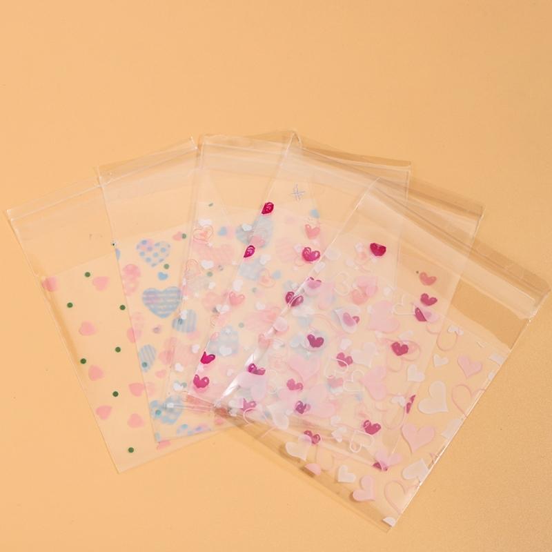 100Pcs Adhesive Treats Packaging Seal Bags Heart Decorated Clear Packaging Bags for Jewelry and Cookie Presentation