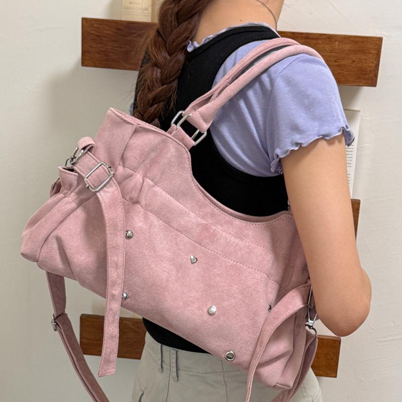 Motorcycle-style Bag with A Lady's Crossbody Strap for Commuting, A Shoulder Bag, and A Tote Bag.