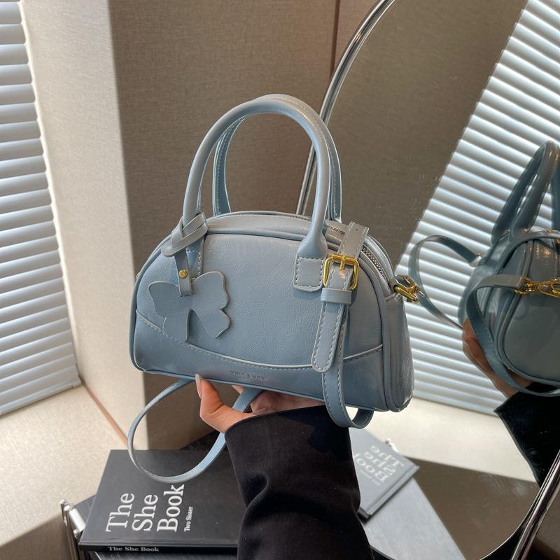 

High-end niche bag women s new spring and summer shoulder messenger bag fashion portable bowling bag синий