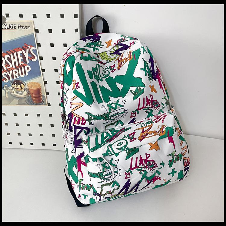 

Легкий рюкзак большой вместимости Новая корейская школьная сумка Высокая ценность Модный и крутой Персонализированный рюкзак с граффити