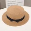 Straw hat women's summer retro temperament top hat seaside play beach sun hat straw woven sun hat