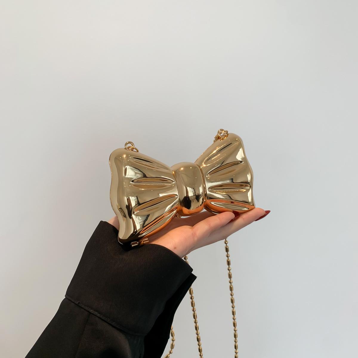 

Metal mini small bag women 2025 new European and American fashion bow foreign style shoulder chain lipstick bag tide