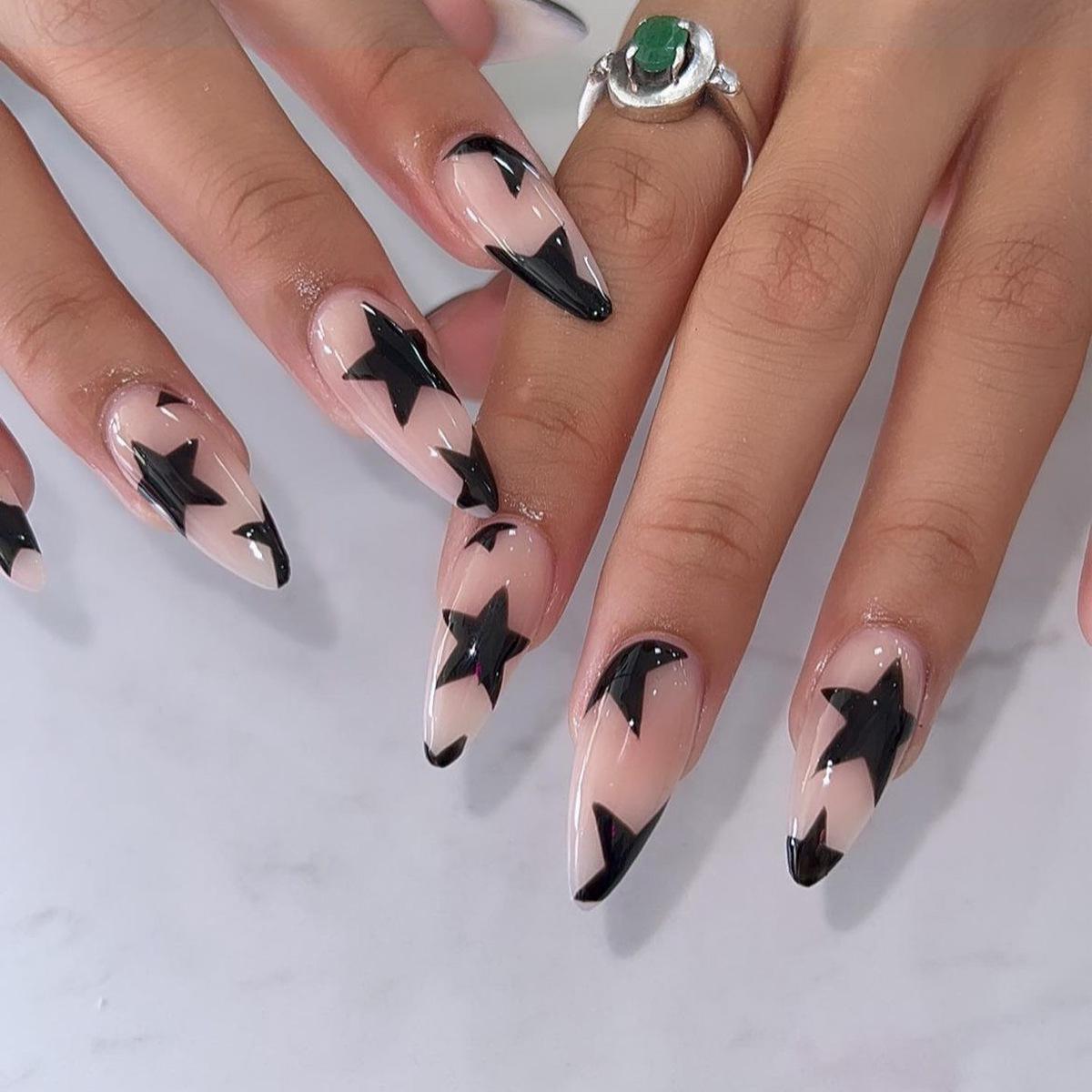 

Almond-Shaped Press-On Nails with Star Embellishments