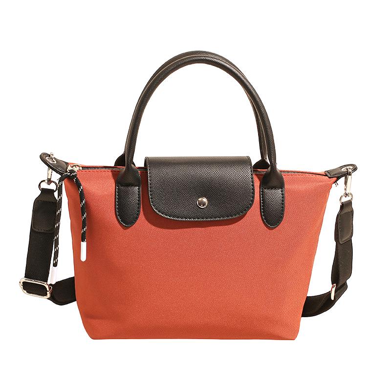 Minimalist Color-Block Oxford Cloth Handbag: Versatile, Fashionable Shoulder Bag with Unique Texture.