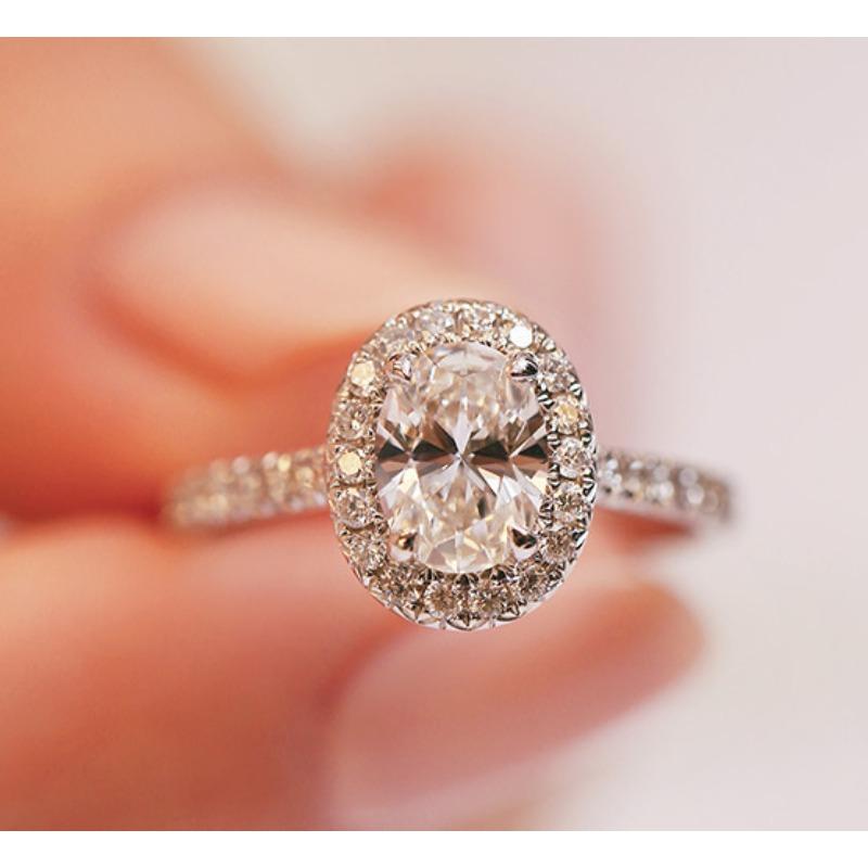 

Нові європейські та американські розкішні транскордонні ювелірні вироби, жіночі модні прикраси, рожево-біла овальна каблучка з цирконом для жінок 6