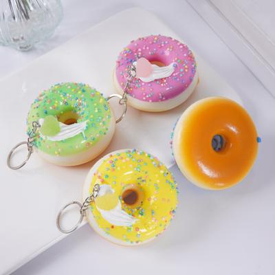 Colgante para Llavero Forma de Rosquilla Tacto Suave Elástico Rebote Rápido Juguete para Apretar PVC Seguro Alivio del Estrés Juguete Fidget