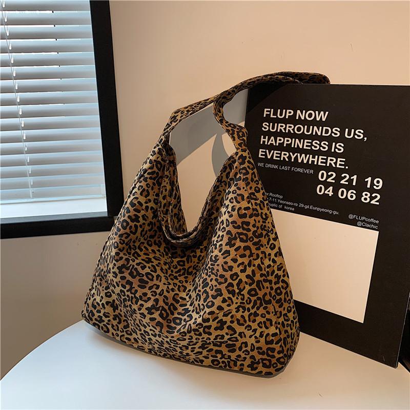 Tasche mit Leopardenmuster Damen große Kapazität 2025 neu Herbst und Winter Freizeit Canvas Schulter-Einkaufstasche Klasse Pendler Tragetasche