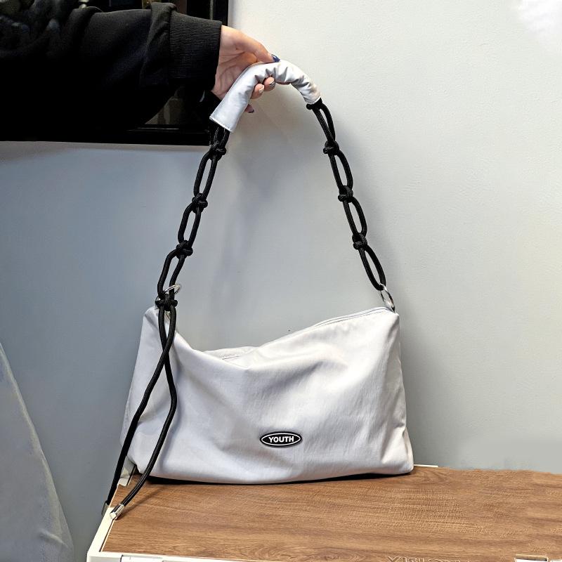 

Spring and summer nylon messenger bag fashion large capacity dumpling bag casual cloth bag fast fashion sale Length 35*height 20*width 11cm серый