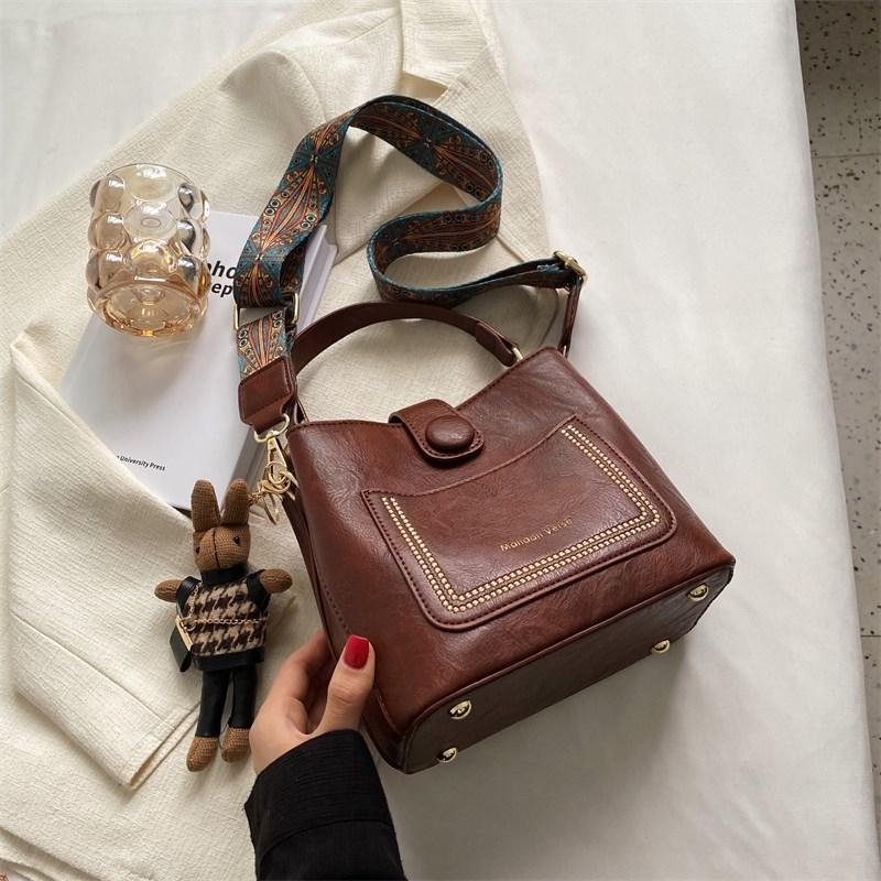 

Нишевый дизайн, ретро, универсальная женская сумка-ведро через плечо - издание с улучшенной текстурой 2024