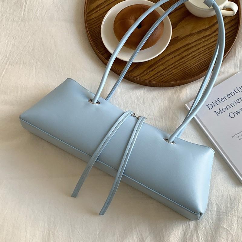 

2025 Cross-border New French Pure Color Fashionable One-shoulder Bag Women s Niche Design High-end Armpit Stick синій
