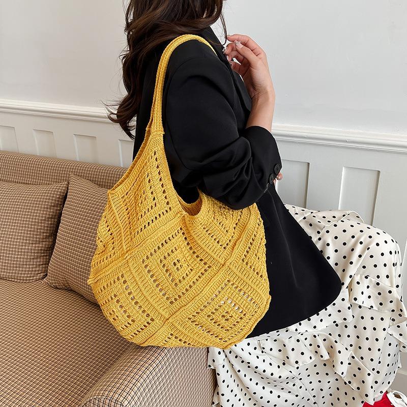 Korean version of fashion hollow knitted bag women's large-capacity seaside vacation shoulder bag versatile woven tote bag