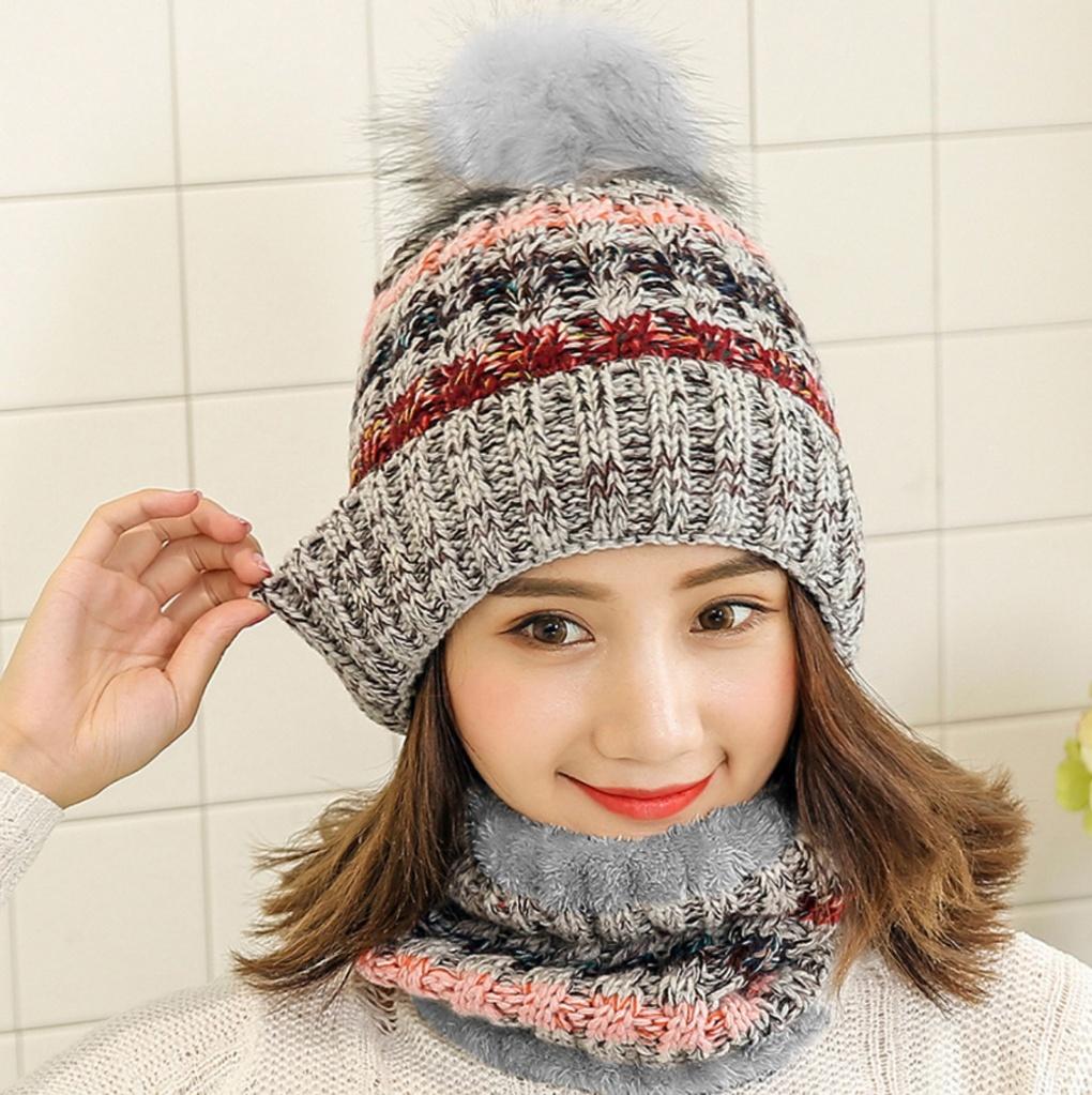 Winter cold weather gear: drop knit neck warmer and fur hat set in gray