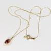 and My Jewelry 10K Yellow Gold Garnet Pendant Oval Cabochon Cut 3017 [Your Box] Necklace, "January Birthstone"