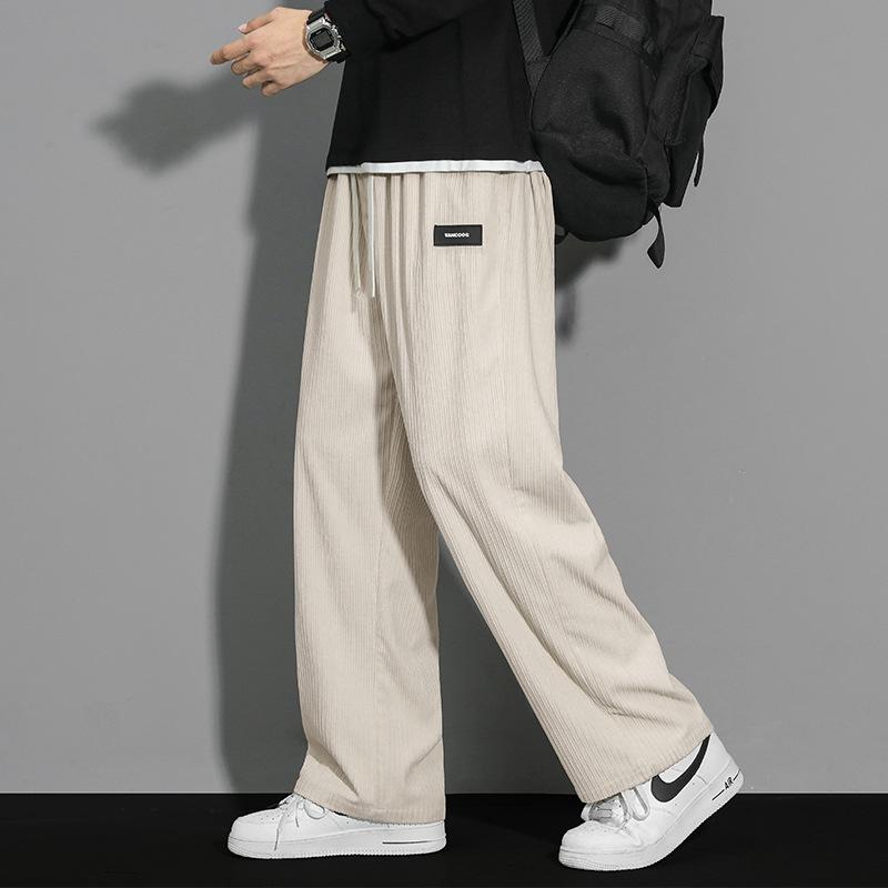 

Вельветовые мужские брюки повседневные брюки зимние новые флисовые утолщенные трендовые свободные прямые спортивные брюки 3XL