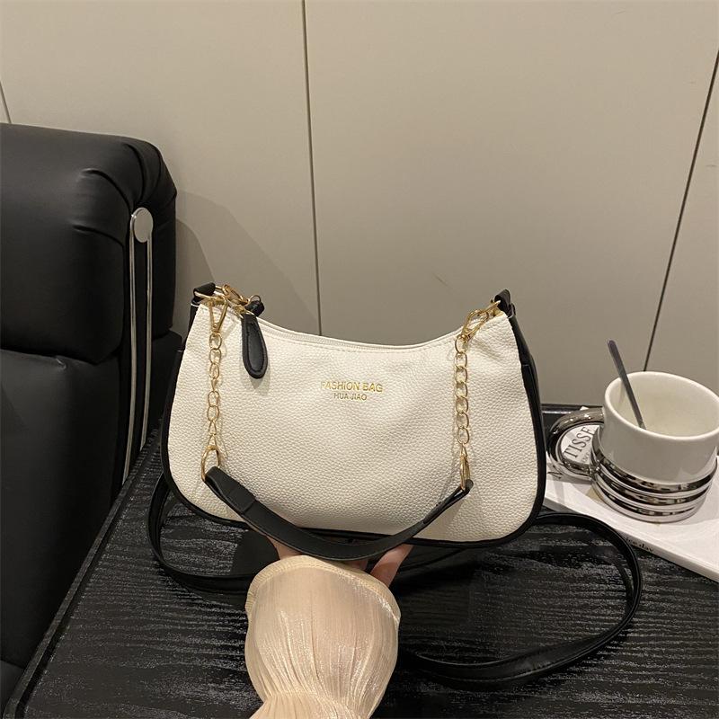 Fashion trend solid color underarm bag women's 2026 new shoulder handbag texture shoulder messenger bag handbag