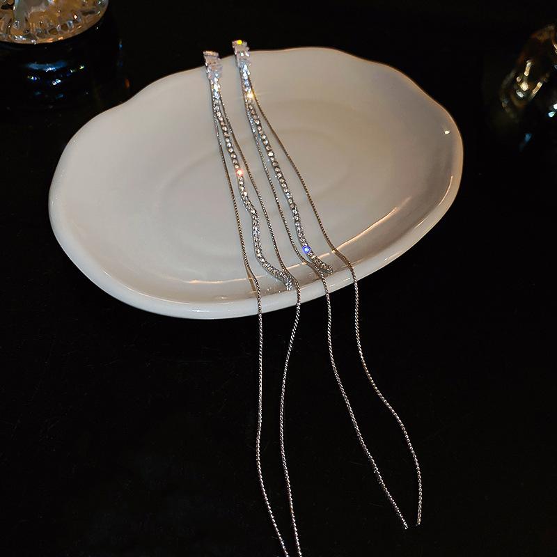 

Супер яркие циркониевые серьги французский легкий роскошный темперамент длинные серьги с бахромой модные нишевые персонализированные серьги