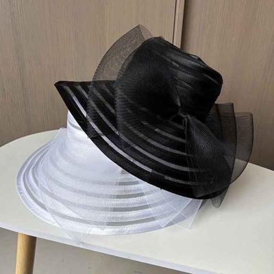 Chapeau en organza et résille à volants tendance à large bord avec grand nœud Chapeau de soleil Respirant Chapeau de plage Tenue de villégiature