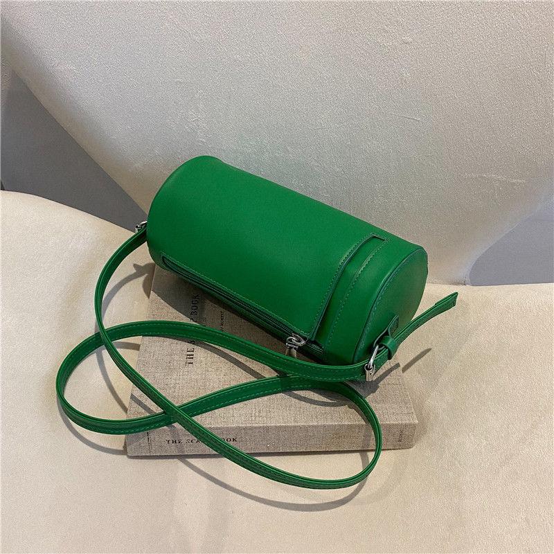 

Hong Kong style texture retro bag women s 2025 new fashion personality cylinder bag cylindrical creative shoulder messenger bag зелений