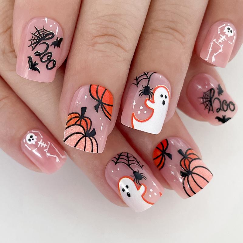 

Spooky Halloween Nail Art: Bat, Pumpkin & Ghost Designs - Black Manicure Tips