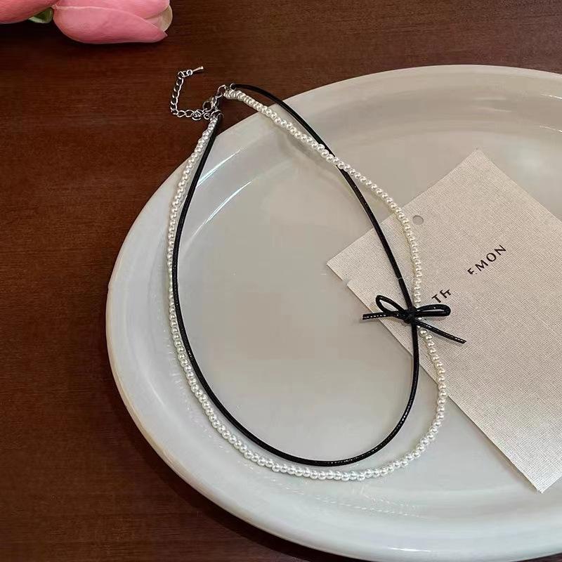 Double bow pearl necklace female design sense Spice girl sweet cool wind neck chain new choker leather rope with jewelry
