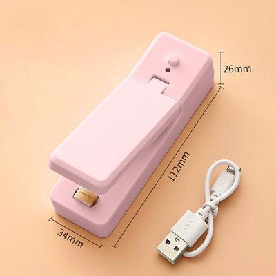 Těsnicí stroj Malá domácí nabíjecí přenosná svačina Plastový sáček Těsnící artefakt Mini plastový těsnící stroj