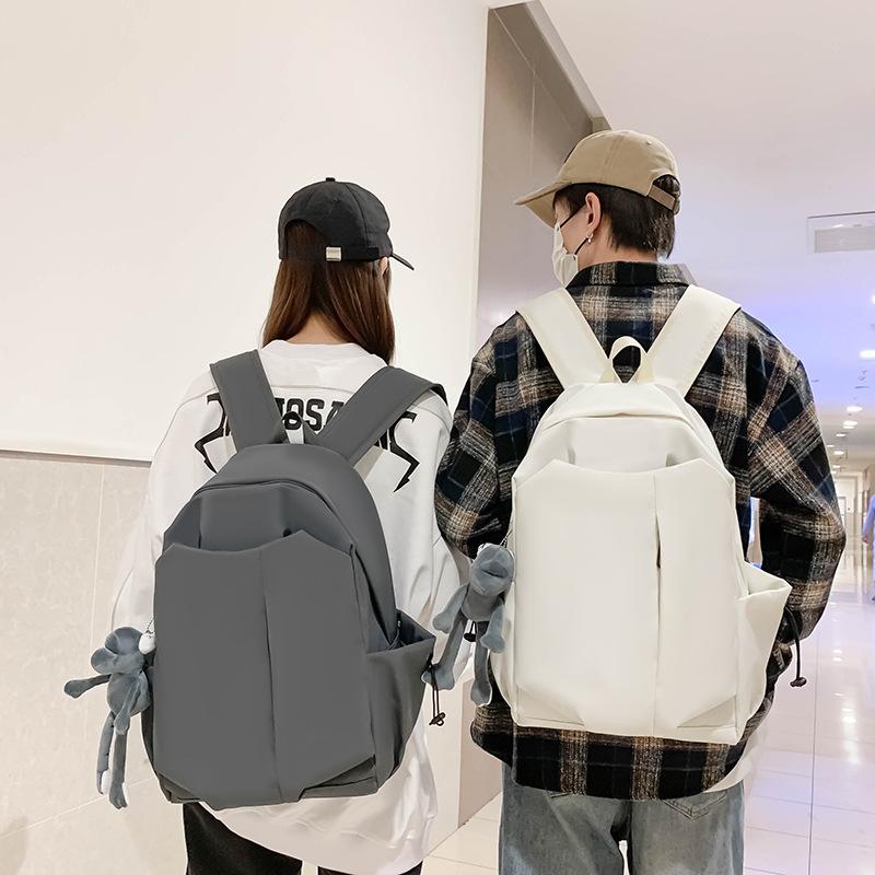 Schoolbag New Solid Color Simple Large Capacity Student Junior High School Primary School Backpack Lightweight Trendy Cool Men's and Women's