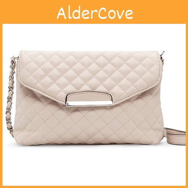 Versatile Women's Leather Clutch Handbag With Classic Appeal And Adjustable Strap