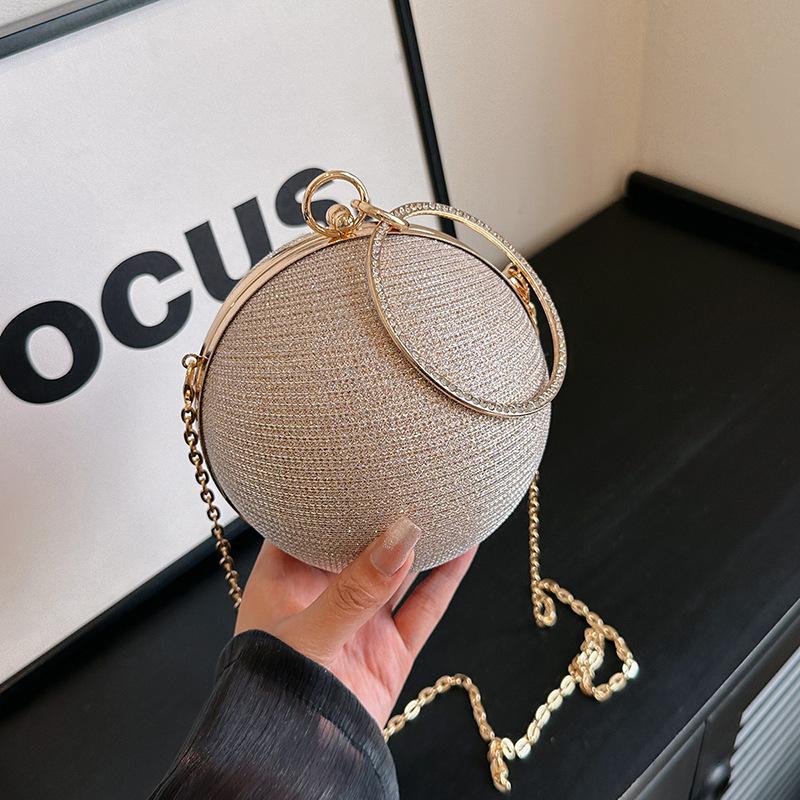 Runde Balltasche im Nischendesign für Damen, neue tragbare High-End-Messenger-Kette, kleine Tasche, Abendessentasche, Mini-Lippenstifttasche