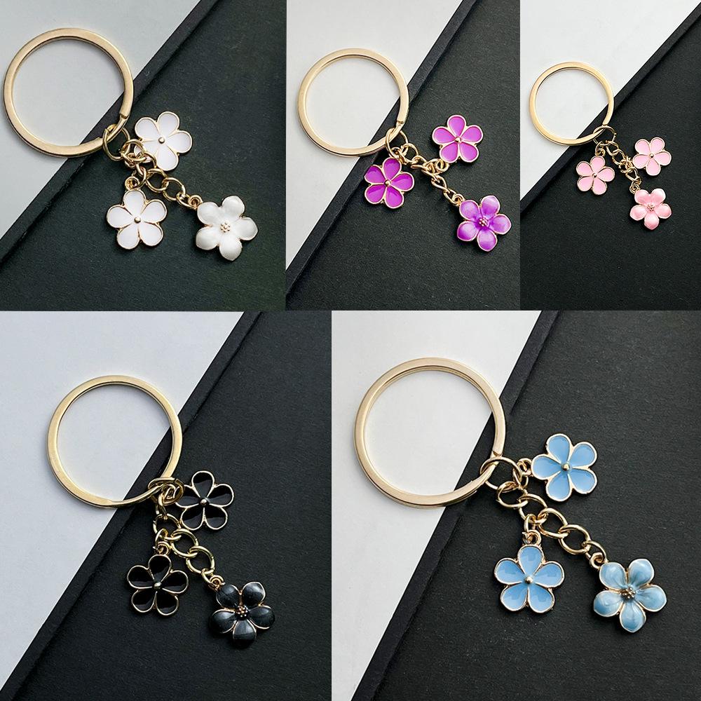 Sakura Oil Drop Keychain – Available in Black, White, Blue, Pink, Purple | Multiple Colors and Metal Parts | Luggage Accessory