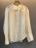 Available: Off-white Pleated Stand Collar Long Sleeve Shirt for Women - Spring/Summer 2026 Collection