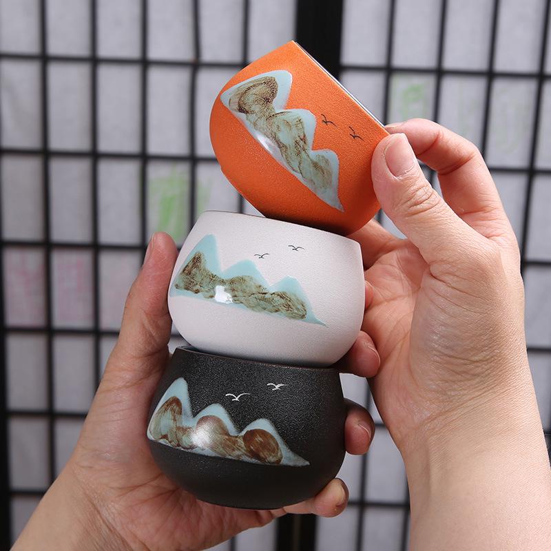 Hand-Painted Black Pottery Zen Tea Cup - Retro Mountain Design, Kung Fu Ceramic Masterpiece for Tea Tasting and Guest Reception.