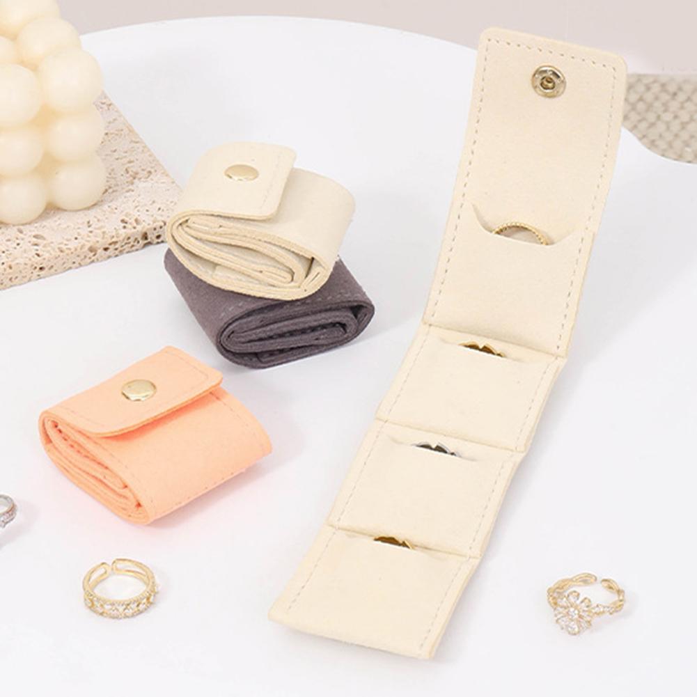 Compact Travel Jewelry Organizer Bag with Secure Button Closure Separate Compartments for Rings Earrings Necklaces