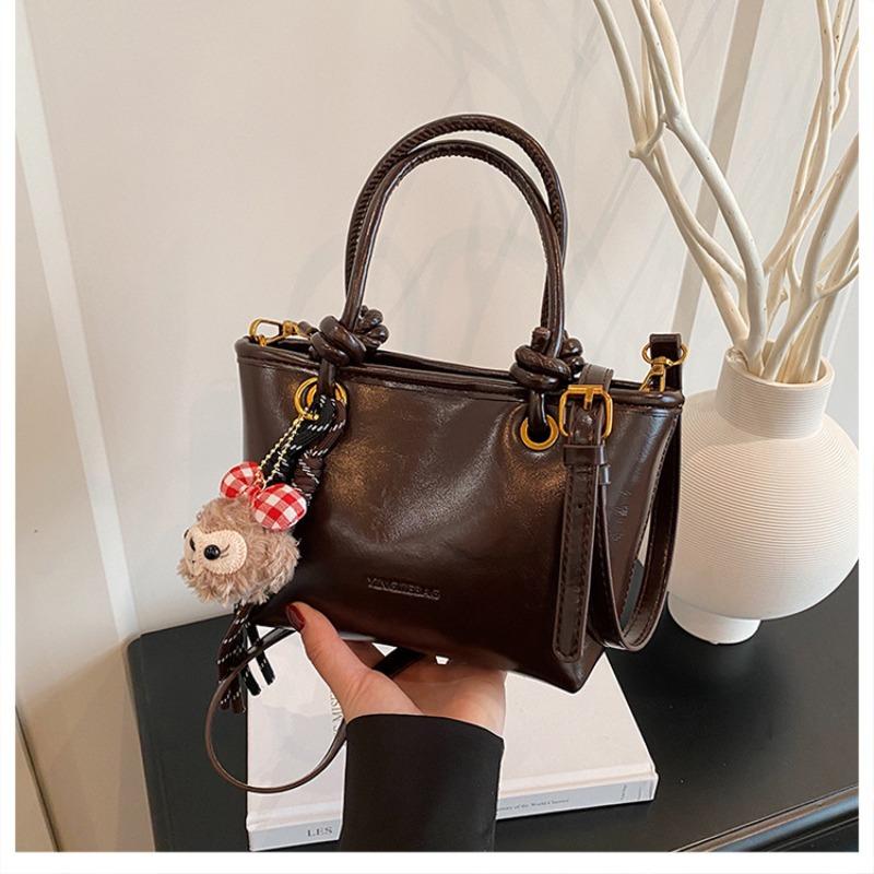 

High-end white small bag women s new spring and summer versatile textured messenger bag super fire portable bucket bag темно-коричневого кольору