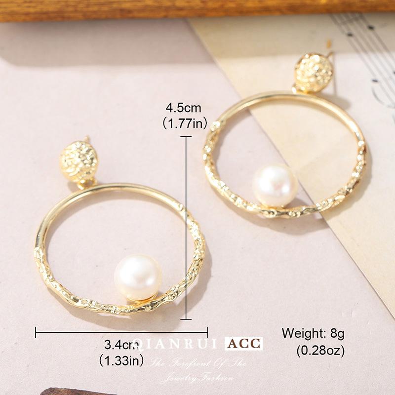Korean style niche natural pearl earrings temperament geometric hollow stud earrings texture advanced sense earrings Internet popular women 14k