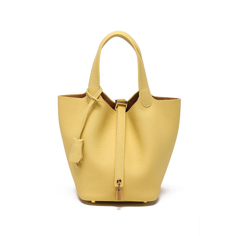 

Жіноча сумка-відро зі шкіри корови: Маленький, універсальний, преміальний для роботи або поїздок