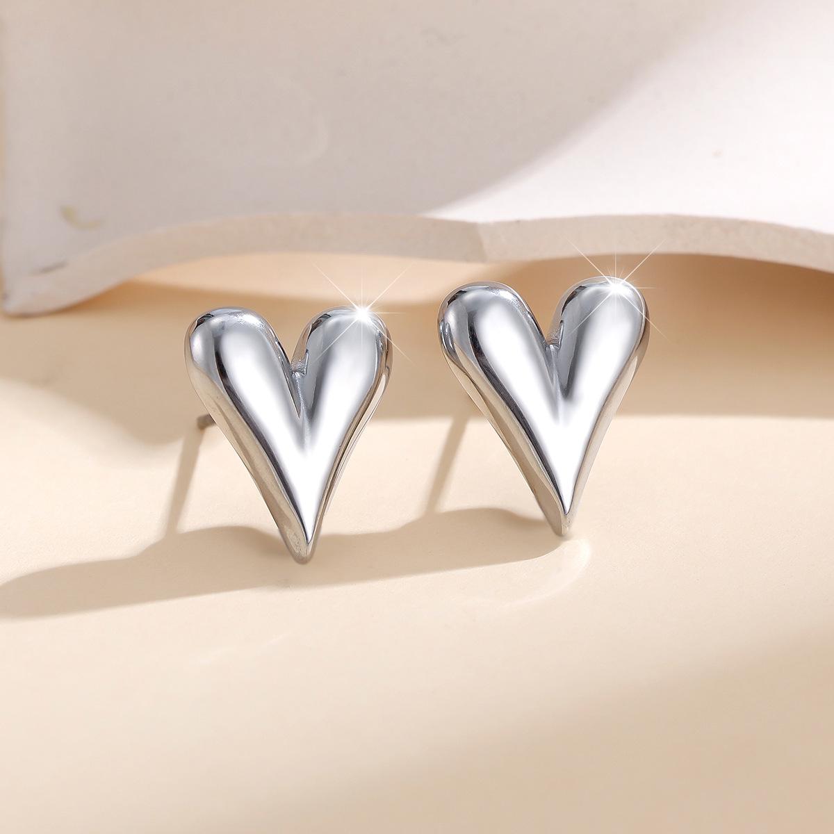 

Серьги из титановой стали с минималистичным дизайном в виде сердца с золотым покрытием, 2025: Легкая роскошь и не выцветающий белый