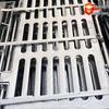 Ductile Iron Cast Sewer Manhole Cover with Sloped Channel Flat Grate
