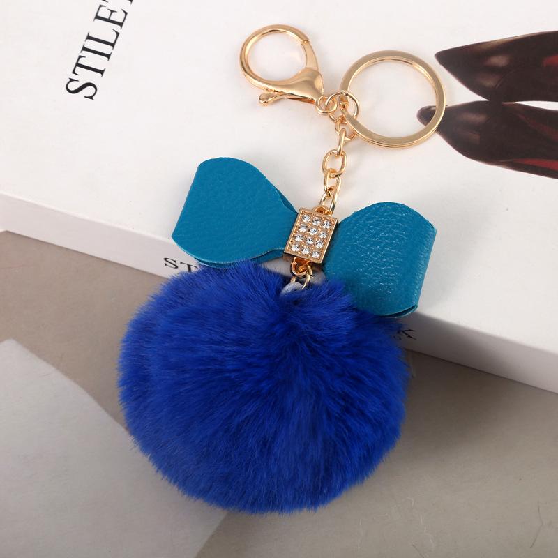 

Faux Fur Pom Pom Keychain Women Girls Plush Ball Bag Backpack Pendant Creative Rhinestone Pu Leather Bow Car Keyring GiftS сапфірове скло синього кольору кольору