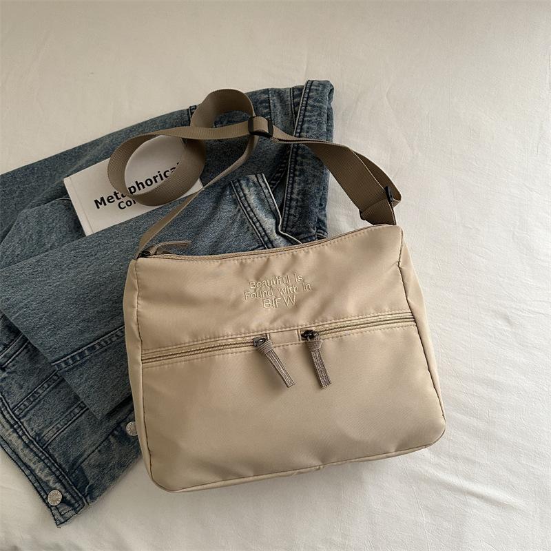 2025 spring new casual light cloth bag Japanese style solid color simple letter shoulder bag crossbody high value