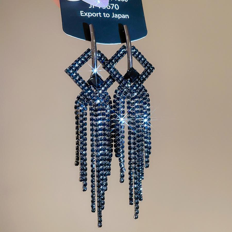 Silver Needle Water Drop Tassel Earrings - Light Luxury High-End Design for Women's Fashion.