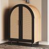 Elegant sideboard/shoe cabinet with rounded exterior, openwork rattan doors and three shelves.