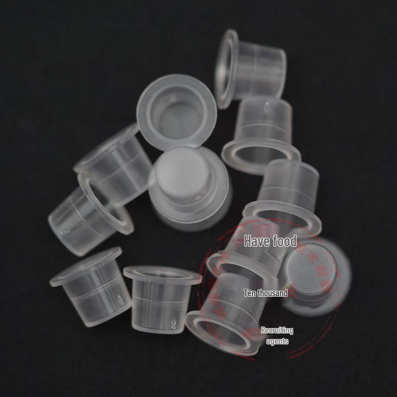 100 jednorázových kelímků na tetovací barvy: Střední a malé, měkký silikon, plastové misky