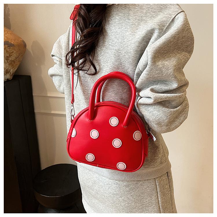 Polka dot niche bag women's spring new fashion versatile messenger bag portable bucket bag