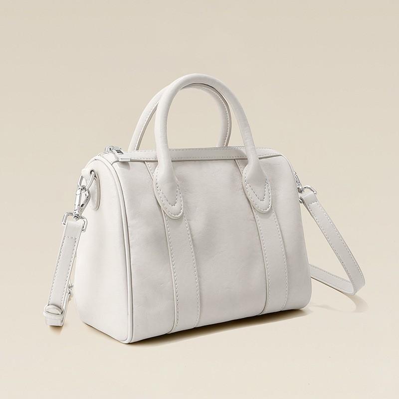 

Сумка-подушка Коровья кожа растительного дубления Натуральная кожа Женская Нишевый дизайн Портативная Большая вместимость Boston Ретро Через плечо 22x12x17cm белый