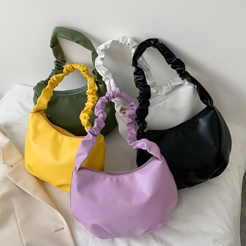 purple sling bolsa