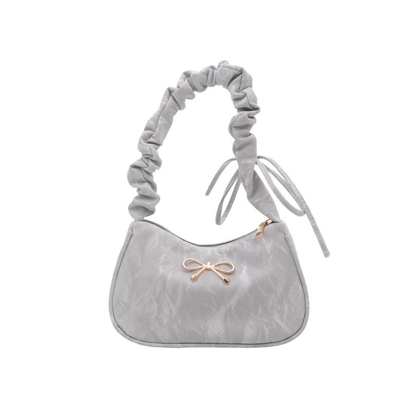 Early spring new bow armpit sweet and fresh foreign style to work commuting fashion shoulder handbag