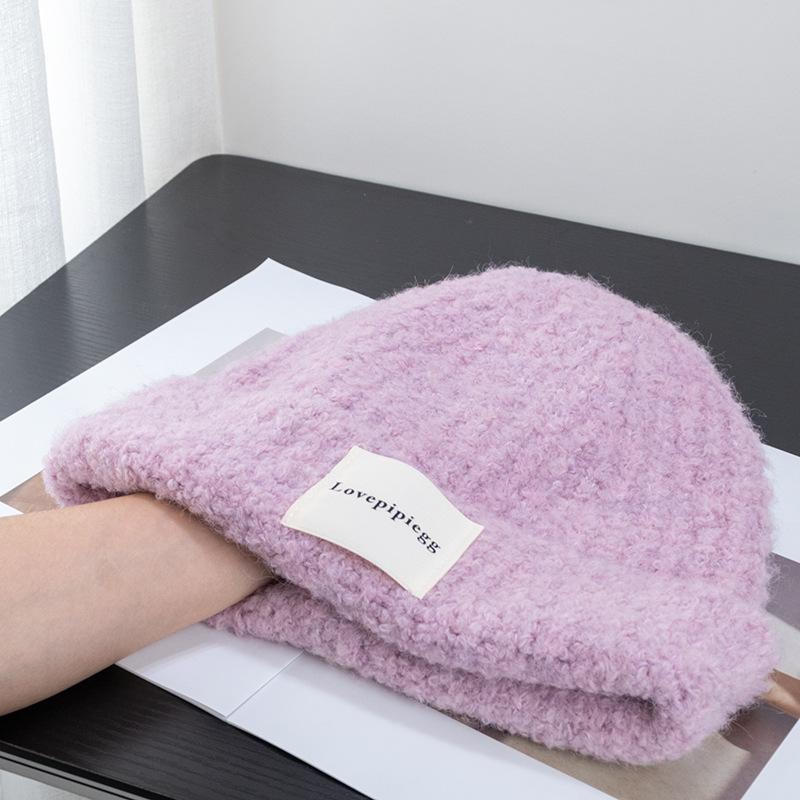 

Японская универсальная теплая белая вязаная шапка с этикеткой для женщин с большой головой и маленьким лицом, зимняя защита ушей, вязаная шапка для мужчин L（56-63cm）