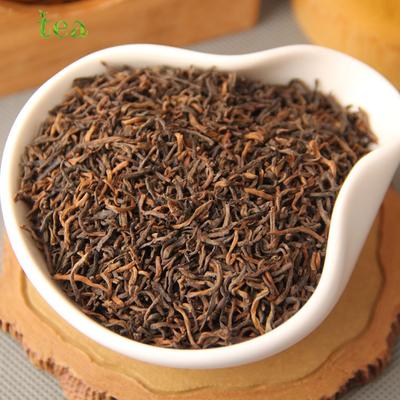 Yunnan çayı 2009 yaşlı Puer çayı altın iğneli saray dağınık çay Puer pişmiş çay