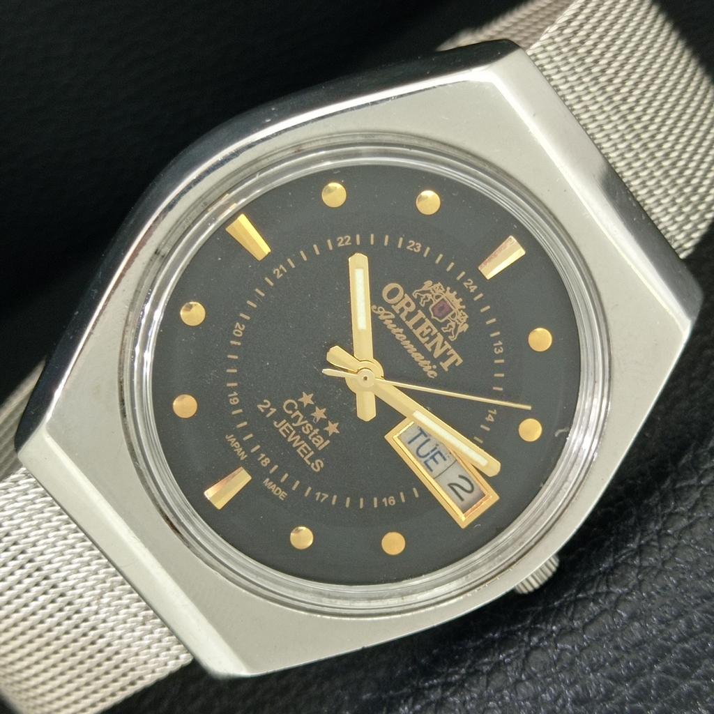 

JAPAN VINTAGE ORIENT CRYSTAL AUTOMATIC MENS BLACK COLOR DIAL WATCH a707760-1