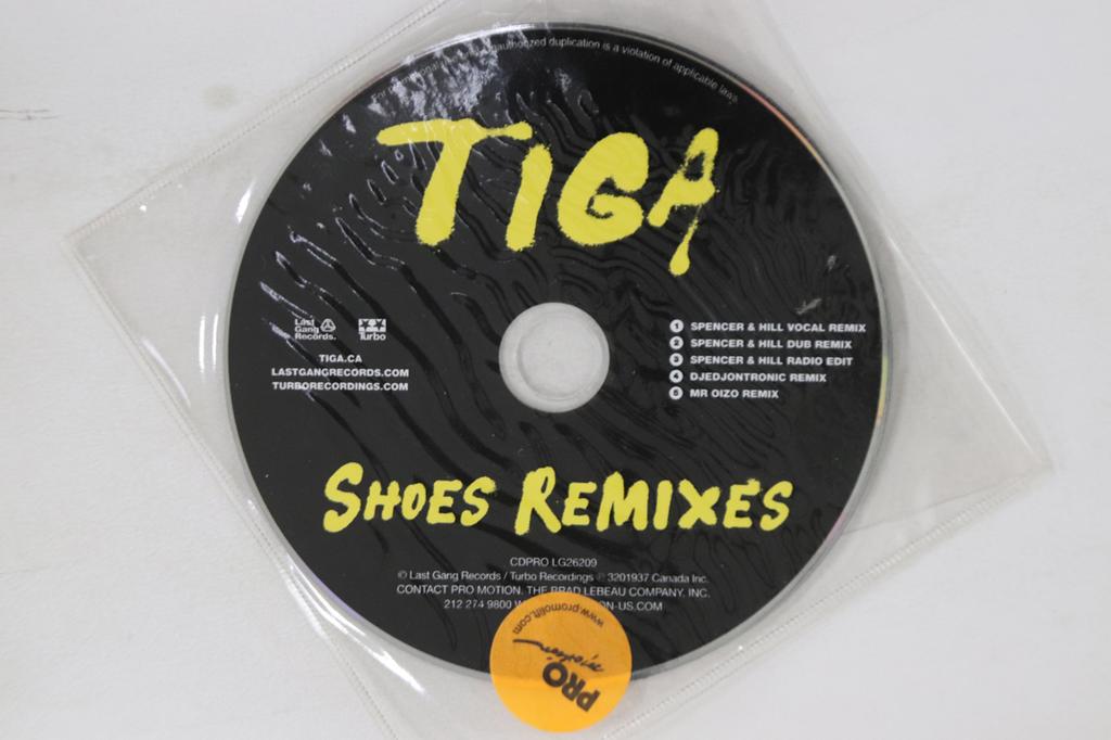 CD TIGA - Shoes Remixes CDPROLG26209PRO LAST GANG 2009 US Dance & Electronica Used